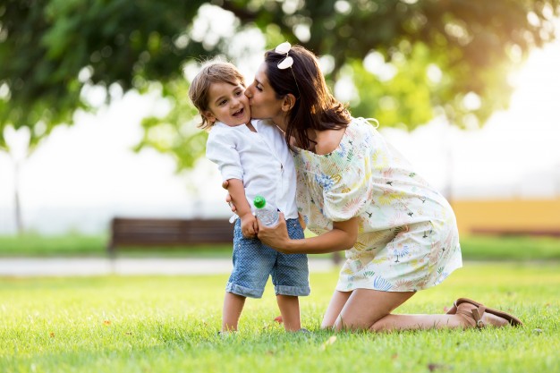 beautiful young mother in love with her son in the park 1301 6261