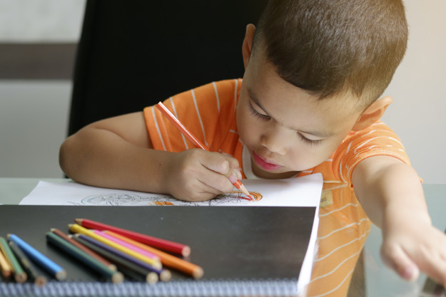 cute boy drawing with color pencils kid learning concept 1384 256