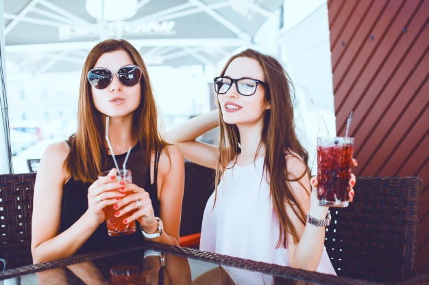 young girls with a drink in hand 1296 2